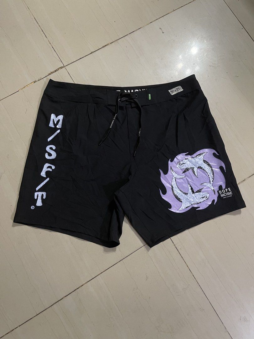 M/SF/T Mad Minds Dope Machine Board Shorts Size 36 (Category: Swim Trunks & Board Shorts) located in Manila. Submitted by stuzzygod (Listing ID 1469085151, Image 1). Description: - Brand: M/SF/T Mad Minds (Dope Machine Collection) - Size 38 - Length 17.5 - Color: Black with purple flame shark graphic and logo details - Size: 36 (tagged on green inner label) - Material: Eco-friendly Repreve recycled polyester and Cocotex blend - Performance: 4-way