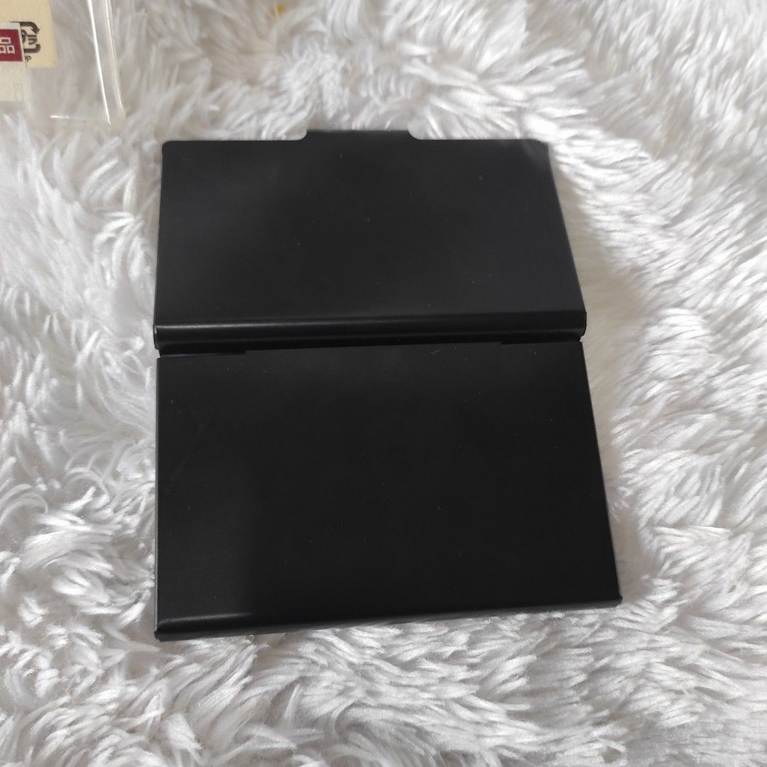 Muji Black Aluminum Card Case (Category: Wallets & Card Holders) located in Cainta. Submitted by fukunekojapansurplus (Listing ID 1468976125, Image 3). Description: Muji 80 pesos Card case Aluminum Holds up to 9 debit/credit cards No issue *Old packaging ✨A quick Yes or No after inquiry is appreciated ✨ 📍 Mayfield Park Residences Felix Ave Cainta 🛵SF c/o Buyer via Lalamove/JNT/LBC 💰 MOP: GCash Our finds are a mix of new & preloved from Japan C