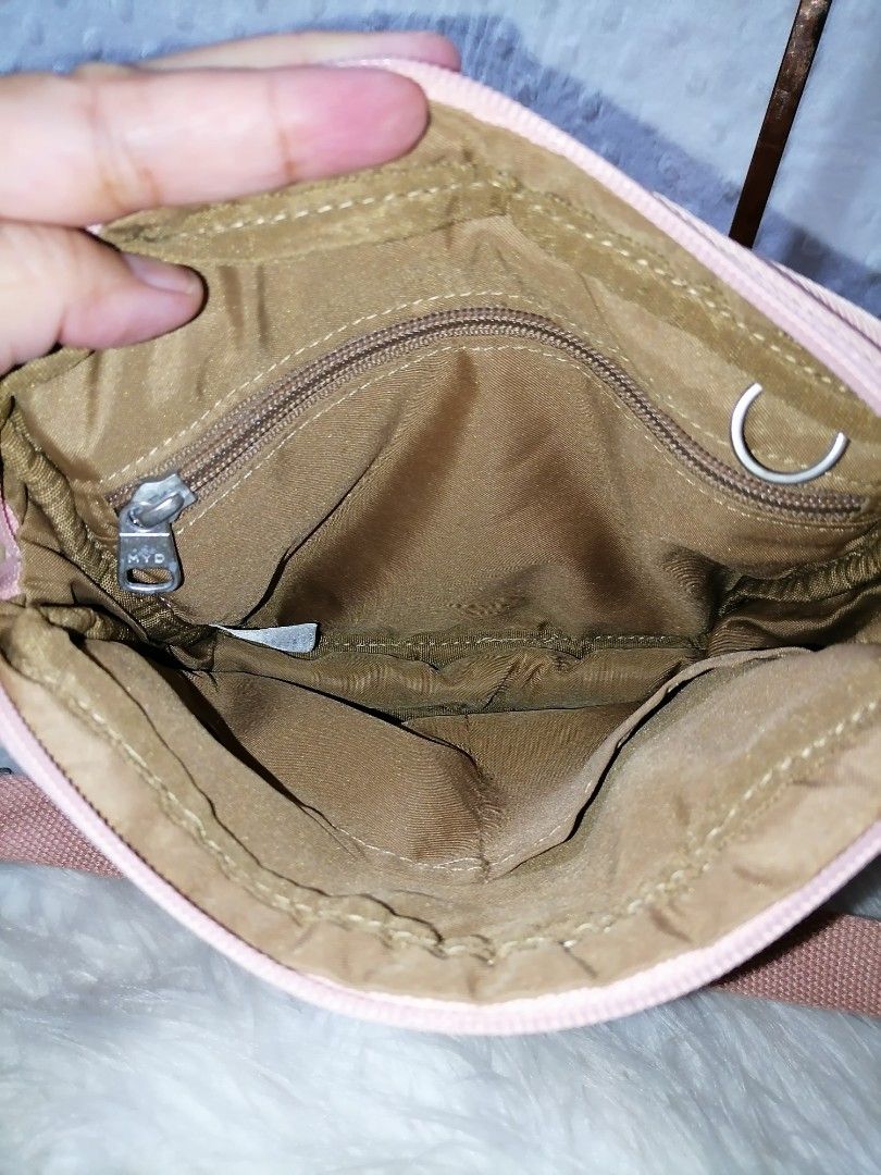 MYD Australia Sling Bag (Category: Cross-body Bags) located in Butuan. Submitted by az-branded.items (Listing ID 1468936969, Image 3). Description: Ang ganda ng quality Matibay po ang materials Washed - ready to use Selected ukay.