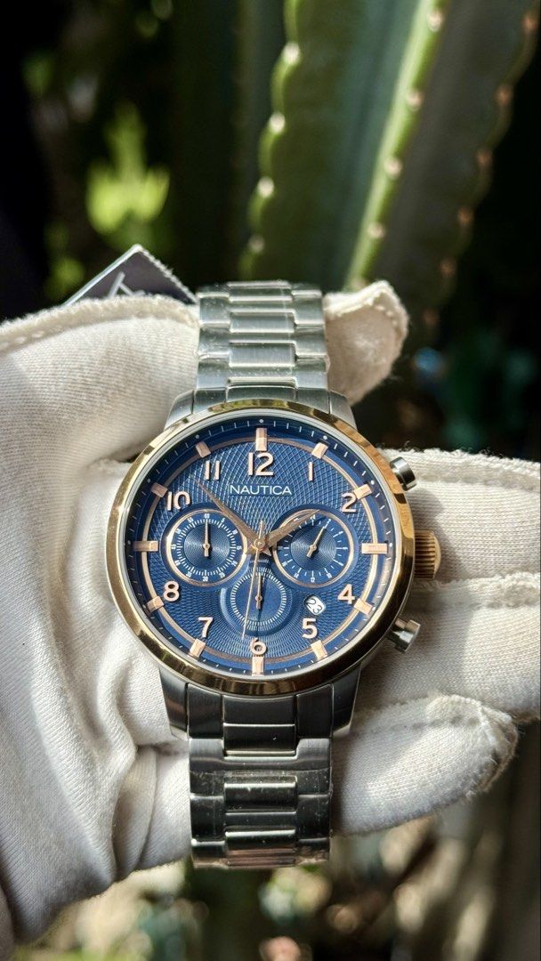 NAUTICA MENS CHRONOGRAPH WATCH (Category: Luxury Watches) located in Manila. Submitted by junjun12356 (Listing ID 1469159202, Image 1). Description: WR100M ALL STAINLESS STEEL MATERIAL BLUE DIAL TEXTURED.
