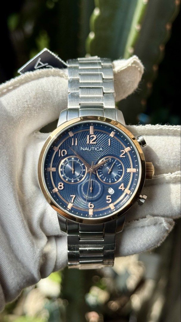 NAUTICA MENS CHRONOGRAPH WATCH (Category: Luxury Watches) located in Manila. Submitted by junjun12356 (Listing ID 1469159202, Image 2). Description: WR100M ALL STAINLESS STEEL MATERIAL BLUE DIAL TEXTURED.