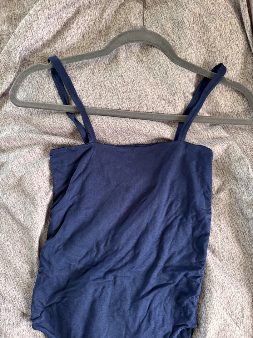 Navy Blue Sleeveless Bodysuit (Category: Sleeveless) located in Quezon City. Submitted by ianne.declutter (Listing ID 1469002887, Image 1). Description: used max 2 times - Color: Navy blue - Design: Square neckline with thin double straps - Material: Soft and stretchy fabric - Features: Convenient bottom snaps, great for layering or on its own - Condition: Excellent, clean with no stains or damage.