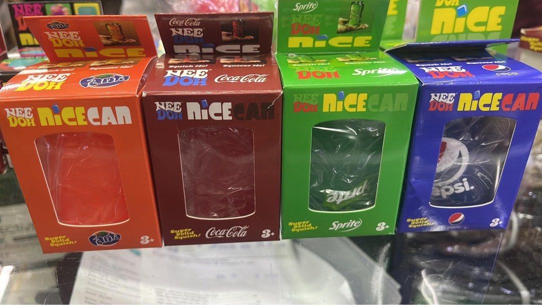 NeeDoh Nice Cube & Nice Can Fidget Toys (Category: Kids Toys) located in Valenzuela. Submitted by new_needoh (Listing ID 1469015644, Image 2). Description: - Collection of NeeDoh sensory squish toys - Includes Nice Cube and Nice Can versions with iconic soda brands (Sprite, Pepsi, Dr Pepper, Fanta, Coca-Cola) - Super solid squish style, perfect for stress relief or display - Brand new, unopened, and in pristine condition - Perfect gift or additio