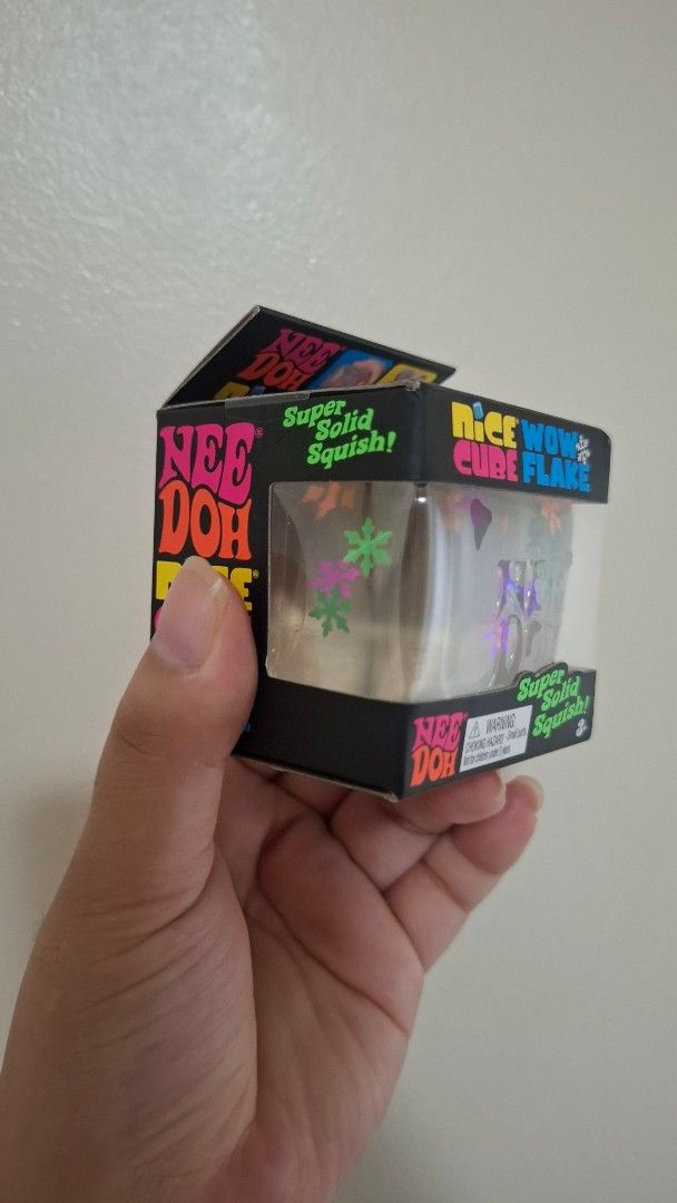 NeeDoh Nice Cube Wow Flake - Very hard to find! (Category: Interactive Toys) located in Pasay City. Submitted by mshannahpi (Listing ID 1468931362, Image 2). Description: - Item: NeeDoh Nice Cube Wow Flake - Condition: Authentic and brand new, unused in original retail packaging - Features: Clear cube filled with vibrant colorful snowflakes and sparkling glitter - Texture: Super solid, satisfying squish for ultimate stress relief and fidgeting - 