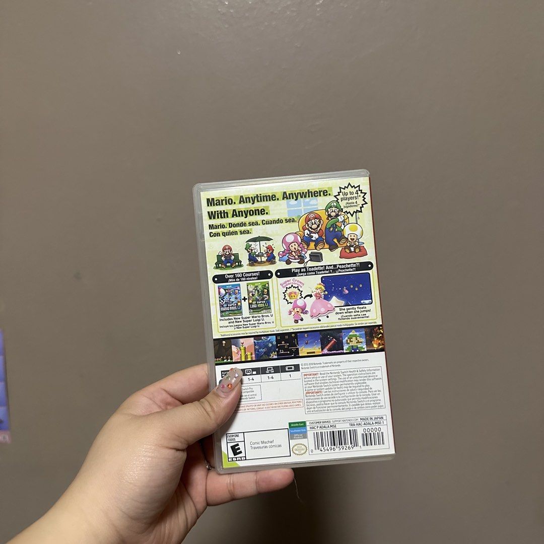 New Super Mario Bros. U Deluxe Nintendo Switch Game (Category: Nintendo) located in Manila. Submitted by jlnclaire (Listing ID 1469156554, Image 3). Description: - Game: Super Mario Bros. U Deluxe for Nintendo Switch - Condition: Physical cartridge in original case, both in great shape - Content: Includes both New Super Mario Bros. U and New Super Luigi U (over 160 courses total) - Multiplayer: Play solo or up to 4 players.