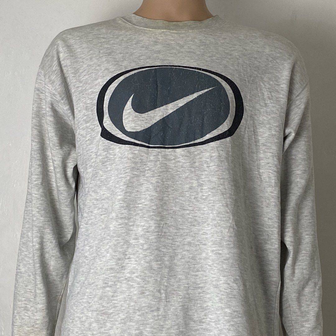 Nike 👟 | Grey Crew Neck Pullover Sweatshirt (Category: Coats, Jackets and Outerwear) located in Bulacan. Submitted by orc.ph (Listing ID 1469065240, Image 3). Description: Nike 👟 | Grey Crew Neck Pullover Sweatshirt Material Used: Cotton-Poly - Grey - Long Sleeve - Crew Neck - Pullover - Double Pockets - Sweatshirt - Sportswear - Casual ‎-Size: L -Width: 22 ‎-Length: 28 ‎ ‎Used Condition. Visible Flaws. ISSUE: Un/Washable Stains. Cracked Print.