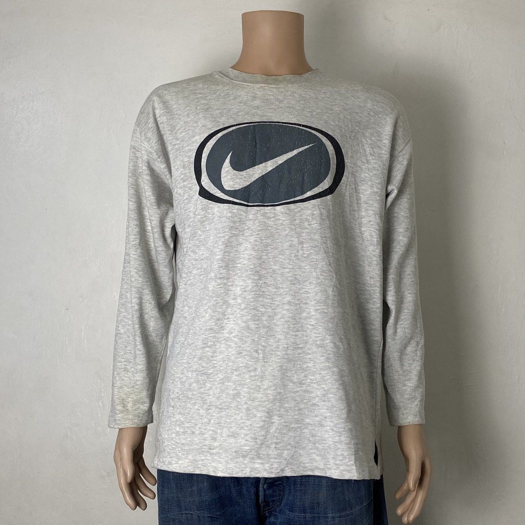 Nike 👟 | Grey Crew Neck Pullover Sweatshirt (Category: Coats, Jackets and Outerwear) located in Bulacan. Submitted by orc.ph (Listing ID 1469065240, Image 2). Description: Nike 👟 | Grey Crew Neck Pullover Sweatshirt Material Used: Cotton-Poly - Grey - Long Sleeve - Crew Neck - Pullover - Double Pockets - Sweatshirt - Sportswear - Casual ‎-Size: L -Width: 22 ‎-Length: 28 ‎ ‎Used Condition. Visible Flaws. ISSUE: Un/Washable Stains. Cracked Print.