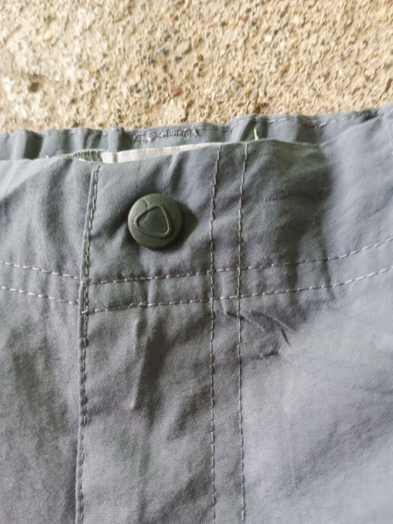 Nike ACG Grey Cargo Shorts Size M (Category: Shorts) located in Manila. Submitted by anjo1 (Listing ID 1468993910, Image 3). Description: - Brand: Nike ACG - Item: Nylon cargo shorts - Color: Grey - Size: Medium - Material: 100% polyester (Made in India) - Waistband: Elastic with button closure - Features: Multiple utility pockets with Nike ACG logo prints - Condition: Great outdoor gear, perfect for hiking or casual wear.