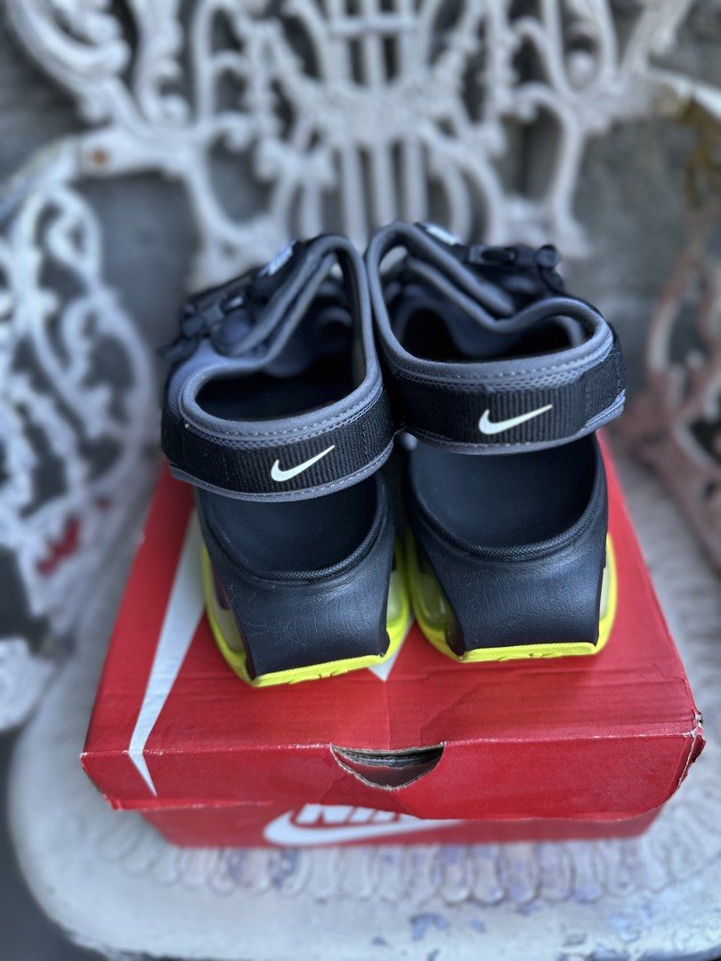Nike Air Max Sol Sandal (Category: Sneakers) located in Marikina City. Submitted by jamescu87 (Listing ID 1469063244, Image 3). Description: - Brand: Nike - Model: Air Max Sol Sandals - Colorway: Grey, Black, and Volt Yellow - Size: EU 41 8us 26cm - Closure: Adjustable straps with buckle and velcro fastenings - Comfort: Iconic Air unit cushioning in the heel for impact absorption - Condition: Soles show minor dirt from previous wear, structure re