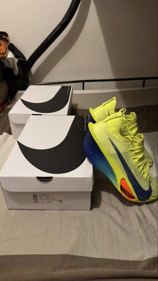 Nike Air Zoom Alphafly Next% 3 Volt Glow Blue (Category: Sneakers) located in Manila. Submitted by kimlj (Listing ID 1468988210, Image 2). Description: - Model: Nike Air Zoom Alphafly Next% 3 - Colorway: Volt and Glow Blue - Size: US 10 / UK 9 / EUR 44 - Tech: High-performance ZoomX foam and carbon flyplate - Inclusion: Original box included - Condition: Brand new and 100% authentic - Shipping: Ships securely within the Philippines.
