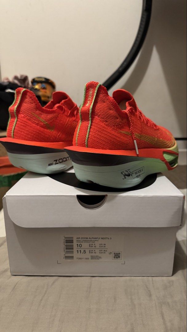 Nike Air Zoom Alphafly Next% 3 Bright Crimson (Category: Sneakers) located in Manila. Submitted by kimlj (Listing ID 1468989680, Image 2). Description: - Model: Nike Air Zoom Alphafly Next% 3 - Colorway: Bright Crimson and Green - Size: Men's US 10 / Women's US 11.5 - Condition: Brand new in original box with paper stuffing intact - Features: High-performance marathon racing shoes with ZoomX foam cushioning and carbon fiber plate.