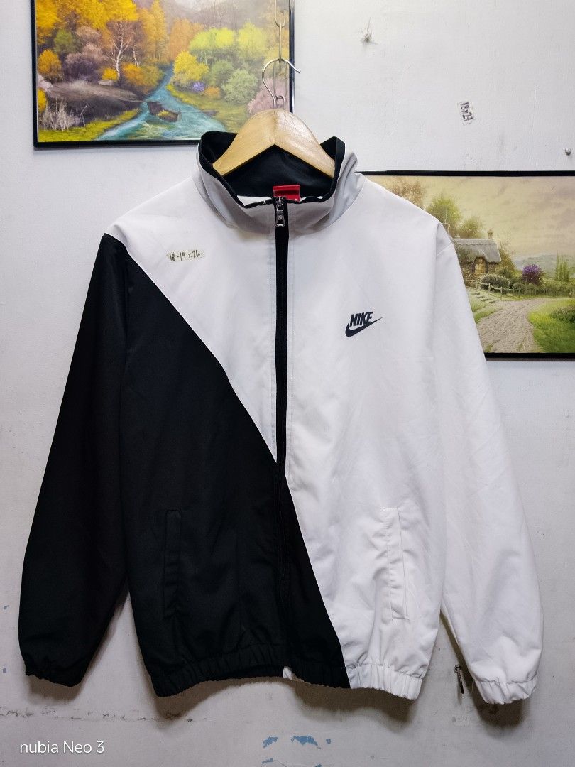 nike big swoosh windbreaker (Category: Coats, Jackets and Outerwear) located in Valenzuela. Submitted by joshwrldselection (Listing ID 1469106575, Image 1). Description: small very good condition need wash (stains) / no washtag thrift..