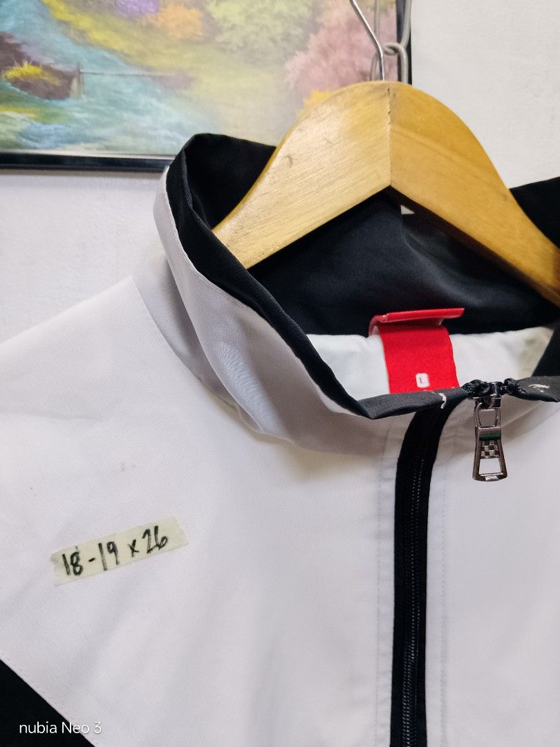 nike big swoosh windbreaker (Category: Coats, Jackets and Outerwear) located in Valenzuela. Submitted by joshwrldselection (Listing ID 1469106575, Image 3). Description: small very good condition need wash (stains) / no washtag thrift..