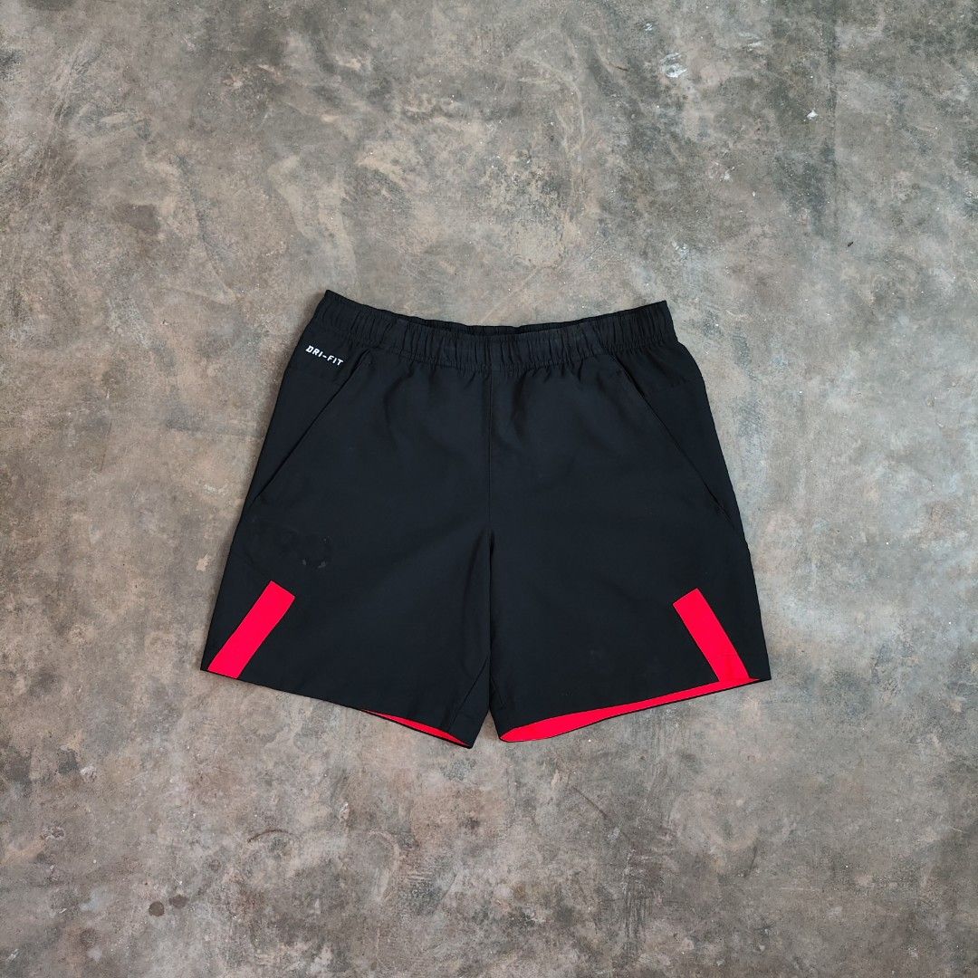 Nike Black Athletic Shorts (Category: Shorts) located in Rosales. Submitted by kudoscache (Listing ID 1469064178, Image 1). Description: - Brand: Nike - Waist: 29-36 | Length: 16 - Color: Black (w/ red) -natanggal yung "T90" na print - slightly nego payment: maribank / gotyme courier: J&T.