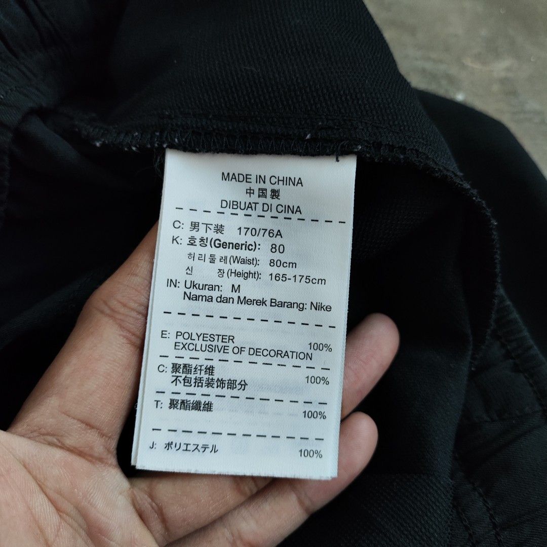 Nike Black Athletic Shorts (Category: Shorts) located in Rosales. Submitted by kudoscache (Listing ID 1469064178, Image 3). Description: - Brand: Nike - Waist: 29-36 | Length: 16 - Color: Black (w/ red) -natanggal yung "T90" na print - slightly nego payment: maribank / gotyme courier: J&T.
