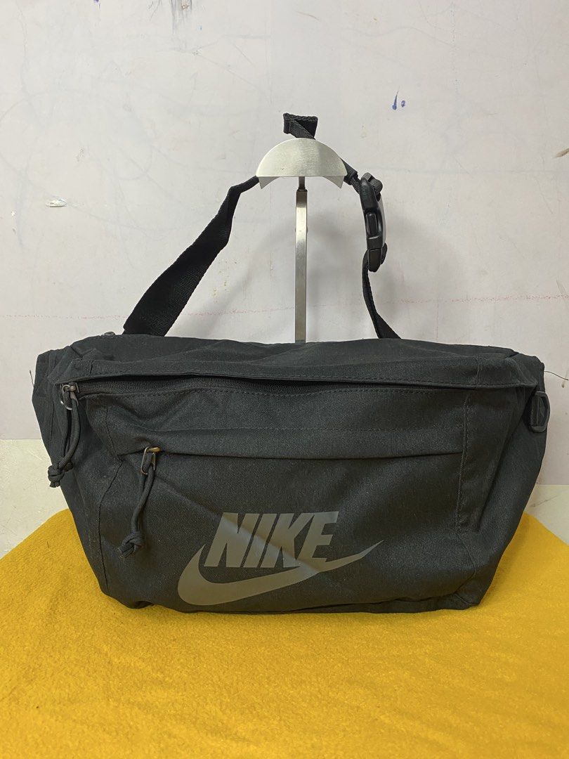 Nike Black Crossbody Bag (Category: Sling Bags) located in Manila. Submitted by onfleekapparelph (Listing ID 1469068134, Image 1). Description: - Authentic Black Nike Crossbody Bag - Style code: BA5751 010 - Large main compartment with secure zipper closure - Convenient internal mesh pocket for organization - Front zippered pocket featuring dual pull cords - Adjustable strap equipped with a sturdy plastic buckle - Bold Nike logo printed on the fr