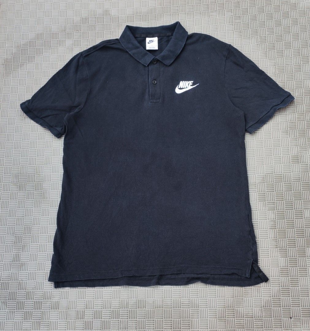 Nike Black Polo Shirt Size L (Category: Tshirts & Polo Shirts ) located in Santa Rosa. Submitted by big.hanger.apparel (Listing ID 1469081302, Image 2). Description: Brand: Nike Gender: Unisex Tag Size: L Actual Measurement: 28" Length × 20" Width Fit: Regular Fit / can fit Medium to Large depending on preferred fit Condition: Very Good — 8/10 Color: Black / Dark Charcoal Design: Classic Nike Swoosh Logo Polo Shirt with collared neckline Material