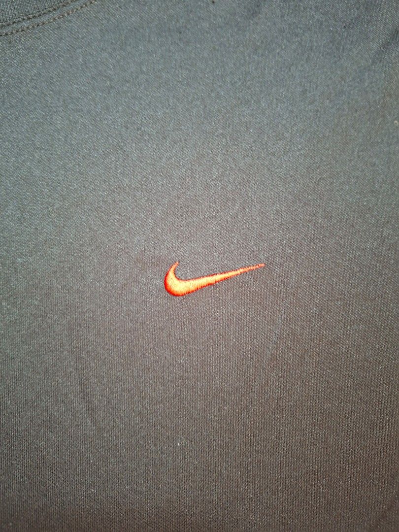 Nike Black Red Athletic T-Shirt (Category: Tshirts & Polo Shirts ) located in Baguio. Submitted by restyrille77846 (Listing ID 1469094846, Image 3). Description: - Brand: Nike - Color: Black with red accents - Style: Athletic t-shirt with short sleeves and crew neck - Details: Embroidered red swoosh on chest and stylish red side piping - Size/Fit: Measures approximately 22 inches across the chest - Condition: Clean neckline print tag, well-mainta