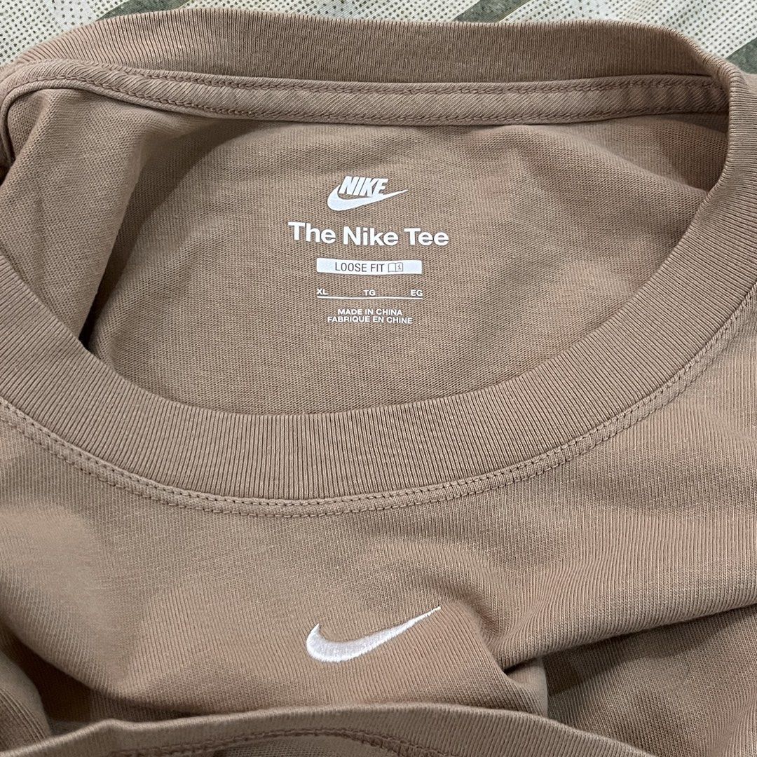 Nike Brown T-Shirt (Category: Shirts) located in Manila. Submitted by princess.01.1 (Listing ID 1468964115, Image 2). Description: XL on tag Oversized look pag S-M J&t only +55sf.