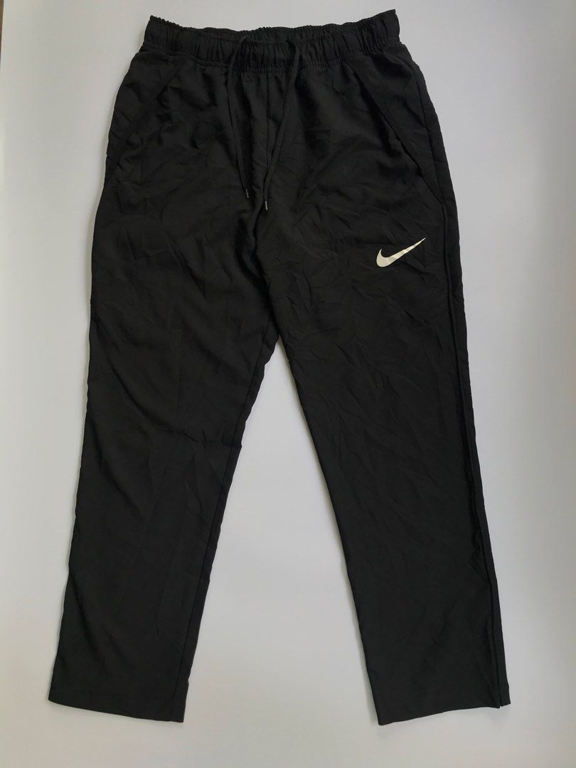 Nike Dri-FIT Black Track Pants Size M (Category: Joggers) located in Manila. Submitted by selme.finds (Listing ID 1468974478, Image 2). Description: - Brand: Nike - Item: Dri-FIT Track Pants - Color: Black - Size: M - Style Code: DM6627-010 - Features: Elastic waistband with adjustable drawstring, side pockets - Material: Lightweight, comfortable fabric ideal for workouts or daily wear - Condition: Brand new / Excellent - Location: Ships from Phi