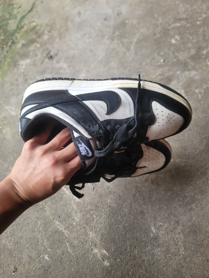 Nike Dunk Low Panda Black White (Category: Sneakers) located in Caloocan City. Submitted by remwil18 (Listing ID 1468934941, Image 3). Description: - Model: Nike Dunk Low - Colorway: Classic Black and White - Style: Low-top skate shoe, ideal for daily wear - Design: Clean contrast panels with iconic Nike branding on tongue, heel, and side swoosh - Comfort & Durability: Lace-up closure with a sturdy rubber outsole providing excellent grip.