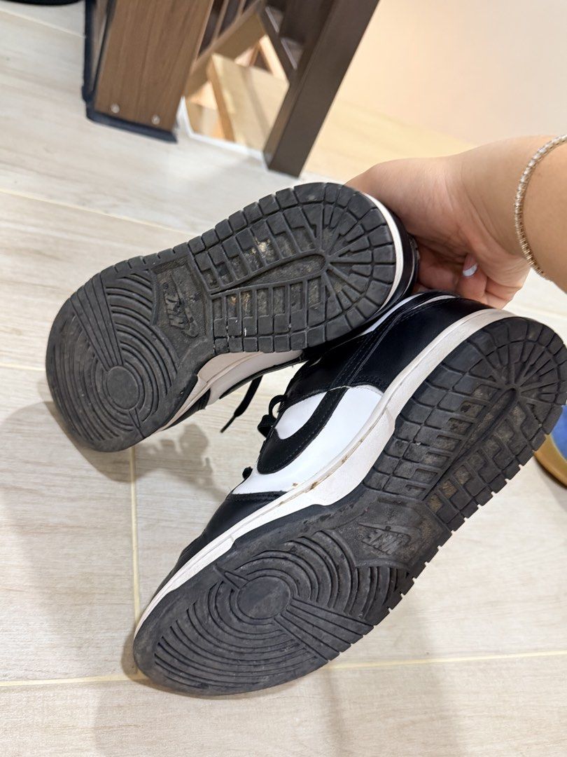 Nike Dunk Low Panda Black White Sneakers (Category: Sneakers) located in Manila. Submitted by suarezmar48444 (Listing ID 1469131317, Image 3). Description: - Item: Nike Dunk Low 'Panda' (Black/White) - Style: Low-top, lace-up, monochromatic design that matches any outfit - Material: Leather upper with breathable perforated toe box - Condition: Used, great for everyday rotation - Flaws: Minor creasing on toe boxes and dirt on soles from previous u