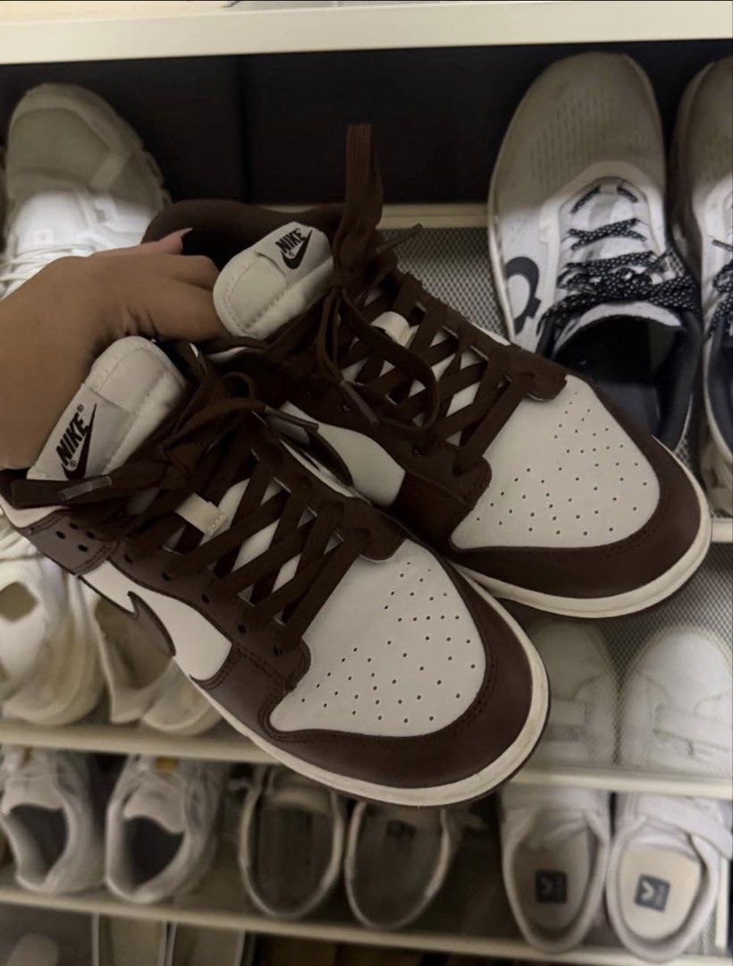 Nike Dunk Low Retro Brown White Sneakers (Category: Sneakers) located in Manila. Submitted by frankietheresee (Listing ID 1468944538, Image 2). Description: - Authentic Nike Dunk Low sneakers - Colorway: Dark brown overlays with crisp white leather panels - Features matching brown laces, tongue tag, and outsoles with clean white midsoles - Classic low-top design ideal for daily rotation - Condition: Brand new / Ready to ship - DM to grab them bef