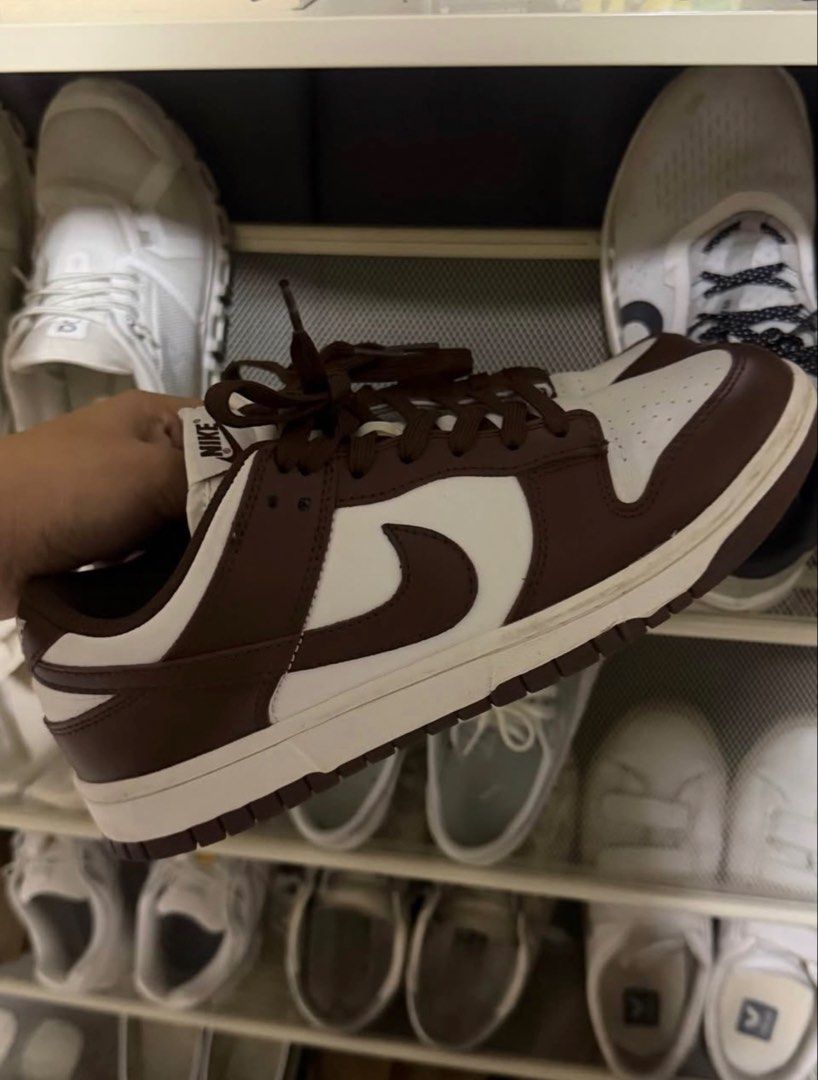 Nike Dunk Low Retro Brown White Sneakers (Category: Sneakers) located in Manila. Submitted by frankietheresee (Listing ID 1468944538, Image 1). Description: - Authentic Nike Dunk Low sneakers - Colorway: Dark brown overlays with crisp white leather panels - Features matching brown laces, tongue tag, and outsoles with clean white midsoles - Classic low-top design ideal for daily rotation - Condition: Brand new / Ready to ship - DM to grab them bef