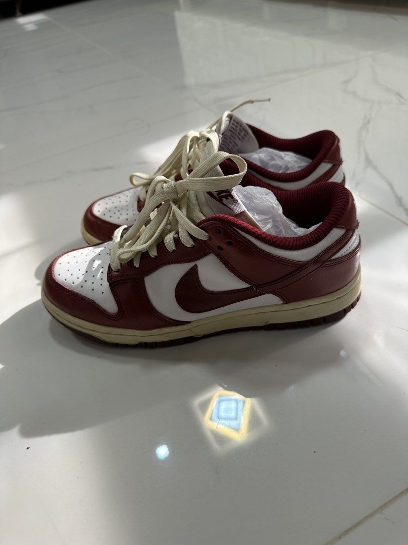 Nike Dunk Low Retro Team Red (Category: Sneakers) located in Quezon City. Submitted by _samanthajyc (Listing ID 1468994595, Image 2). Description: - Model: Nike Dunk Low Retro (Team Red and White) - Size: US 7 / EUR 38 / UK 4.5 - Details: Vintage-style cream laces and matching sail midsole - Design: Classic leather upper with perforated toe box - Condition: Clean outsoles with minimal wear, great for daily rotation.