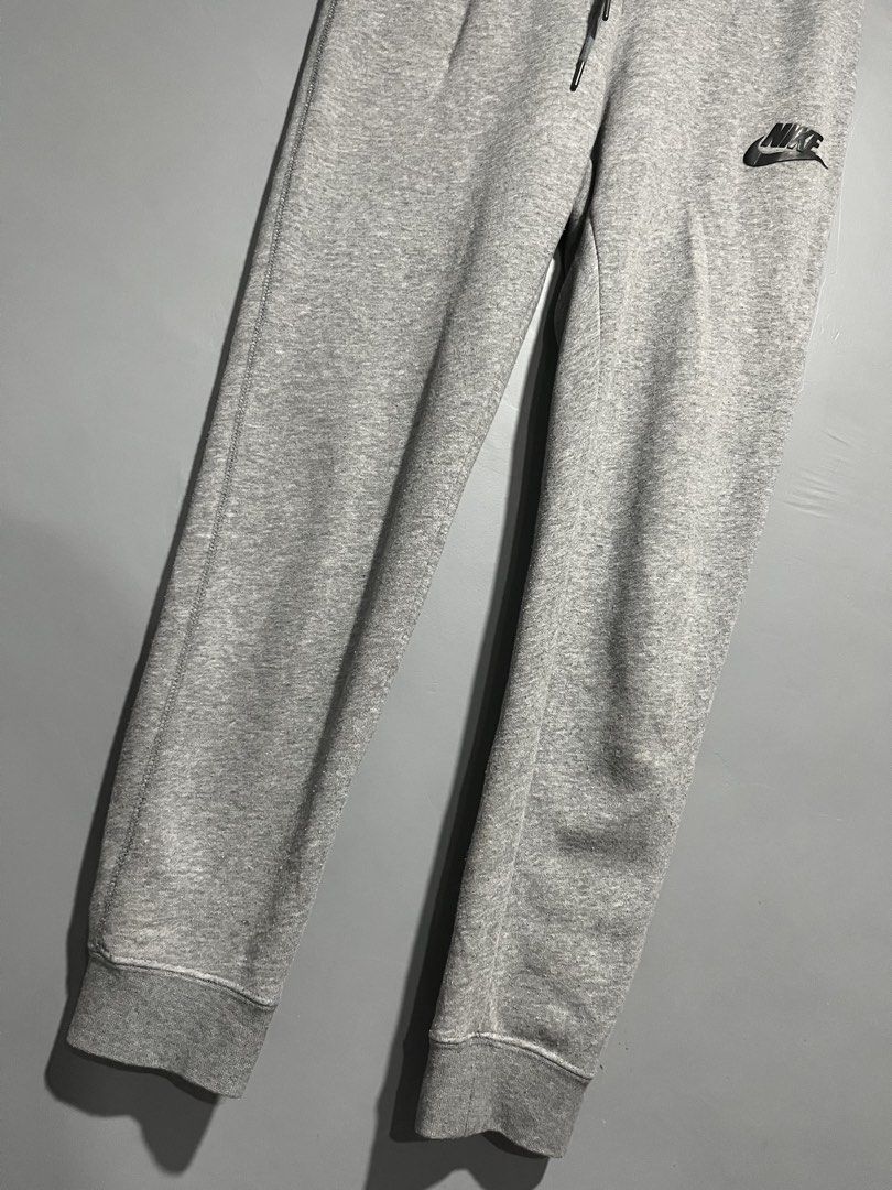 Nike Heather Grey Jogger Sweatpants Size M (Category: Joggers) located in Maasin. Submitted by niconii090 (Listing ID 1468985511, Image 3). Description: - Brand: Nike - Item: Joggers / Sweatpants - Color: Grey - Size: Medium - Interior: Soft fleece lining - Waistband: Elastic with adjustable drawstring - Cuffs: Ribbed at the ankles - Details: Small embroidered black Nike logo on the left thigh - Fit: Regular fit, ideal for daily casual wear -📏 W
