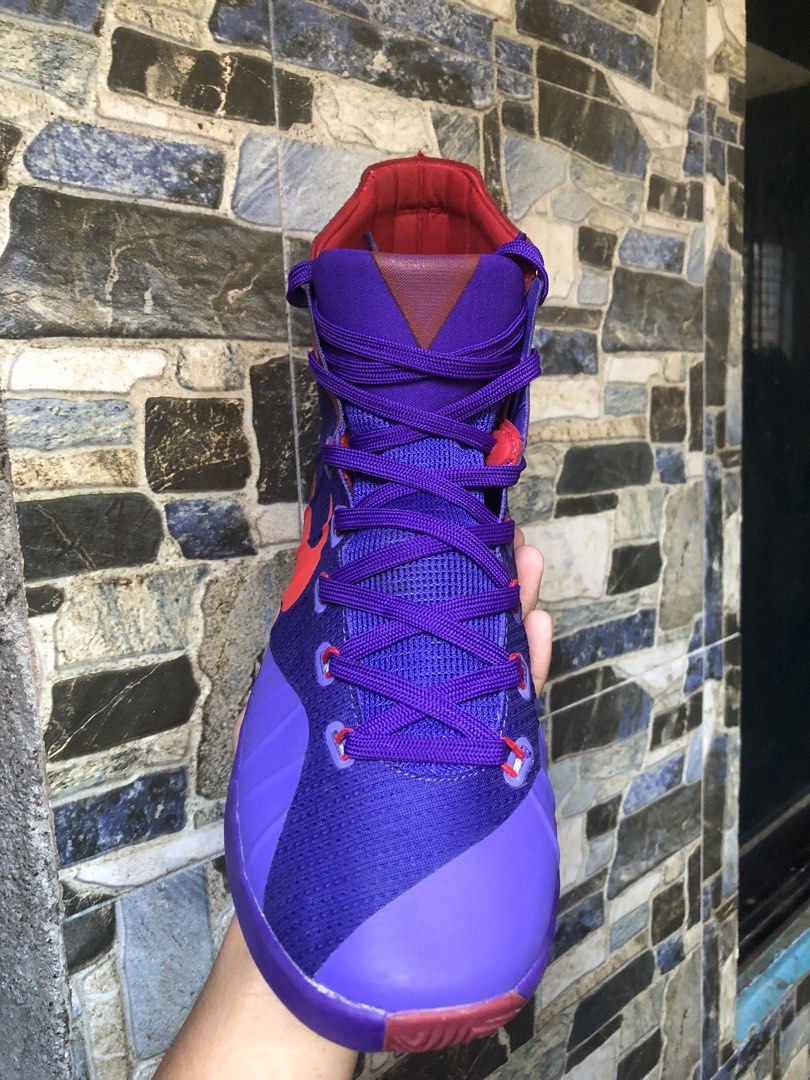 Nike Hyperdunk 2015 “Purple Crimson” (Category: Sneakers) located in Manila. Submitted by shawnmarwi17212 (Listing ID 1469159594, Image 3). Description: - Brand/Model: Nike Hyperdunk 2015 High-Top - Colorway: Purple and red with a bright red Nike swoosh and matching laces - Performance: Textured soles for superior court grip and solid ankle support structure - Condition: Clean upper, ideal for basketball or casual daily wear.