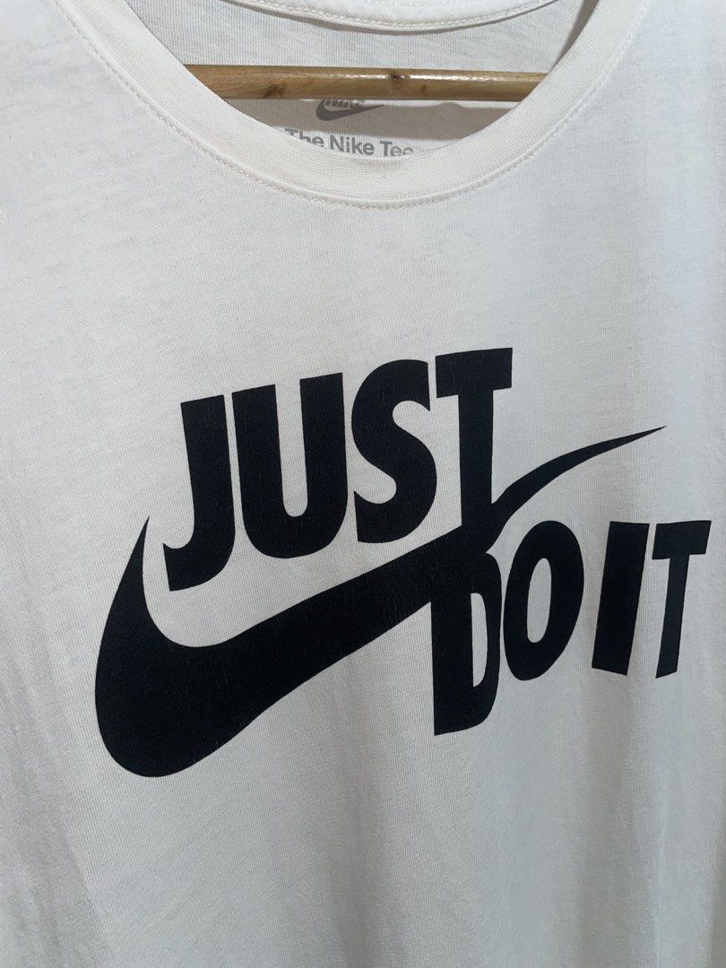 Nike Just Do It White T-Shirt (Category: Shirts) located in Molave. Submitted by thriftedstore.horse (Listing ID 1469101844, Image 2). Description: Condition- excellent Issue- hairline Color rate- 9.8/10.