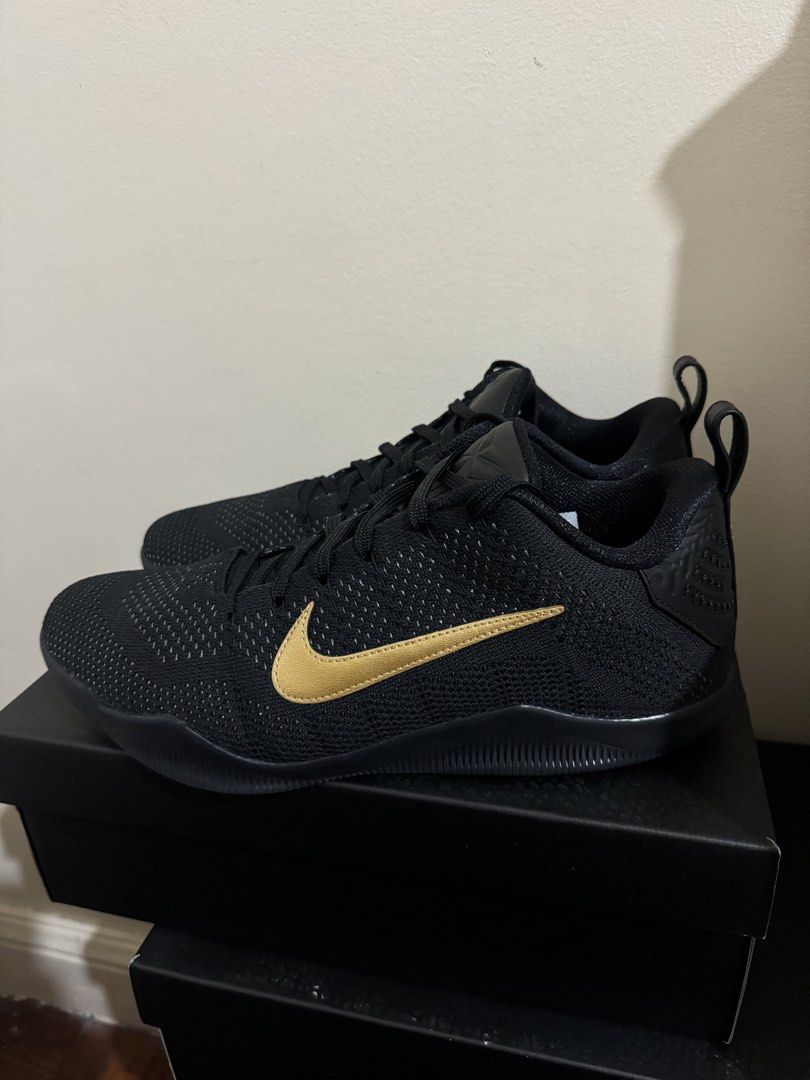 Nike Kobe 11 FTB Size 10.5 (used twice) (Category: Sneakers) located in Pasig City. Submitted by jzm24 (Listing ID 1468983464, Image 1). Description: - Model: Nike Kobe Basketball Shoes - Colorway: Black with Gold Swoosh - Upper: Lightweight and breathable Flyknit construction - Outsole: Textured rubber for maximum grip and traction - Branding: Signature Kobe logo on the tongue - Condition: Great overall condition, soles show almost no wear - Inc