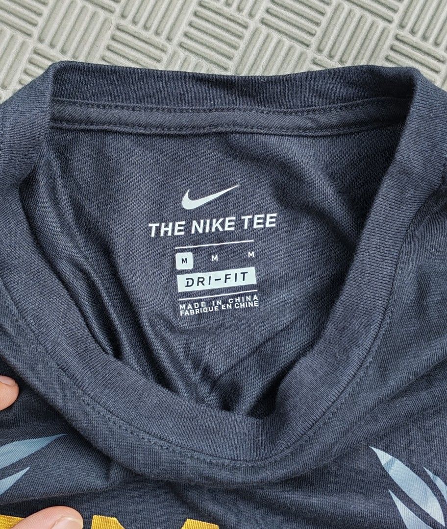 Nike LeBron Strive For Greatness Dri-Fit Tee (Category: Activewear) located in Santa Rosa. Submitted by big.hanger.apparel (Listing ID 1469076531, Image 3). Description: NIKE — THE NIKE TEE • Brand: Nike • Gender: Male • Size: Medium • Fit: Dri-FIT Athletic Fit • Condition: Very Good— 8/10 • Description: Black Nike Dri-FIT T-shirt featuring a bold “LeBron James” inspired crown graphic with laurel wreath detailing and “STRIVE FOR GREATNESS” text o