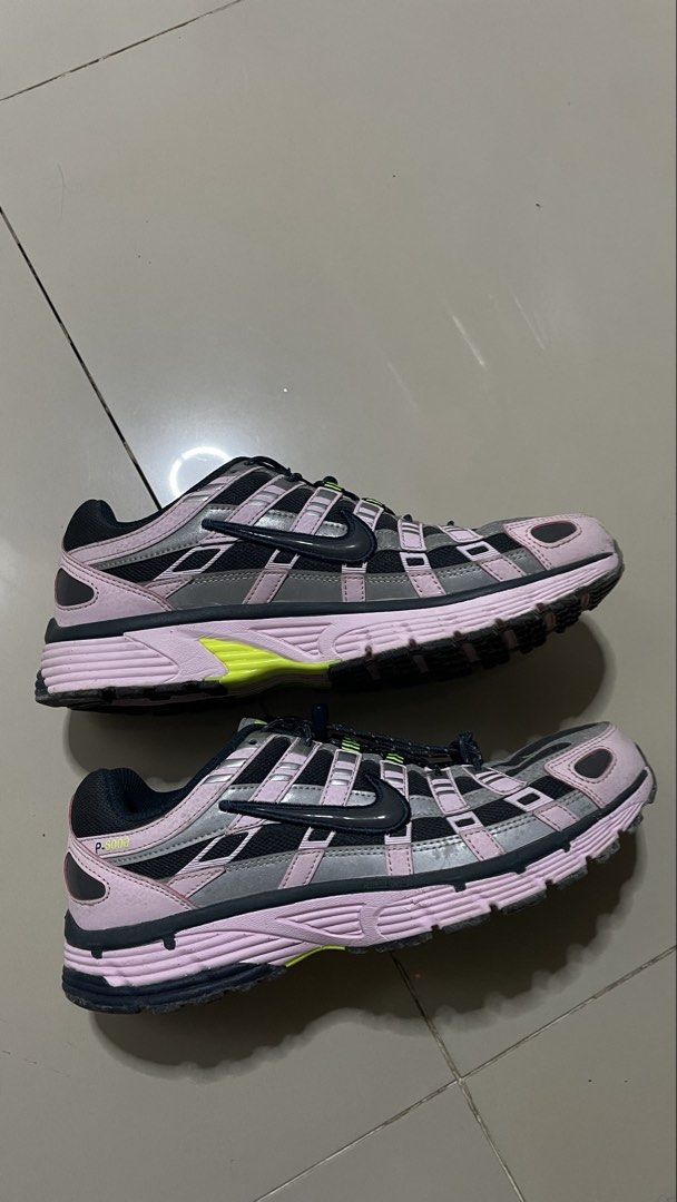 Nike P-6000 Pink Black Grey Sneakers (Category: Sneakers) located in Calamba. Submitted by jonny.1598 (Listing ID 1468974793, Image 1). Description: - Model: Nike P-6000 - Colorway: Pink, black, and grey with striking volt green accents - Closure: Unique bungee lacing setup with toggles - Materials: Breathable mesh base with stylish metallic overlays - Sole: Chunky sole with durable rubber waffle traction - Details: P-6000 branding on the lateral