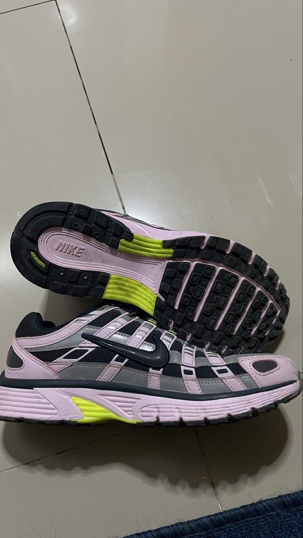 Nike P-6000 Pink Black Grey Sneakers (Category: Sneakers) located in Calamba. Submitted by jonny.1598 (Listing ID 1468974793, Image 2). Description: - Model: Nike P-6000 - Colorway: Pink, black, and grey with striking volt green accents - Closure: Unique bungee lacing setup with toggles - Materials: Breathable mesh base with stylish metallic overlays - Sole: Chunky sole with durable rubber waffle traction - Details: P-6000 branding on the lateral