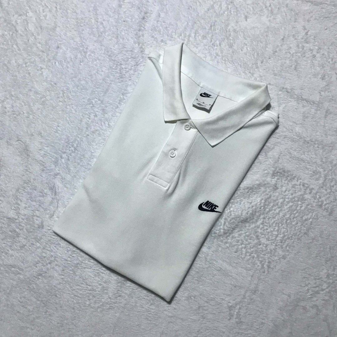 NIKE POLO SHIRT (Category: Activewear) located in Cebu City. Submitted by kevinthrift (Listing ID 1468964915, Image 2). Description: NIKE POLO SHIRT As New Condition Size: XL on tag Dimes: Length 30 | Width 22 Color rate: 9.5/10 Issue stain (REMOVABLE) Need wash.