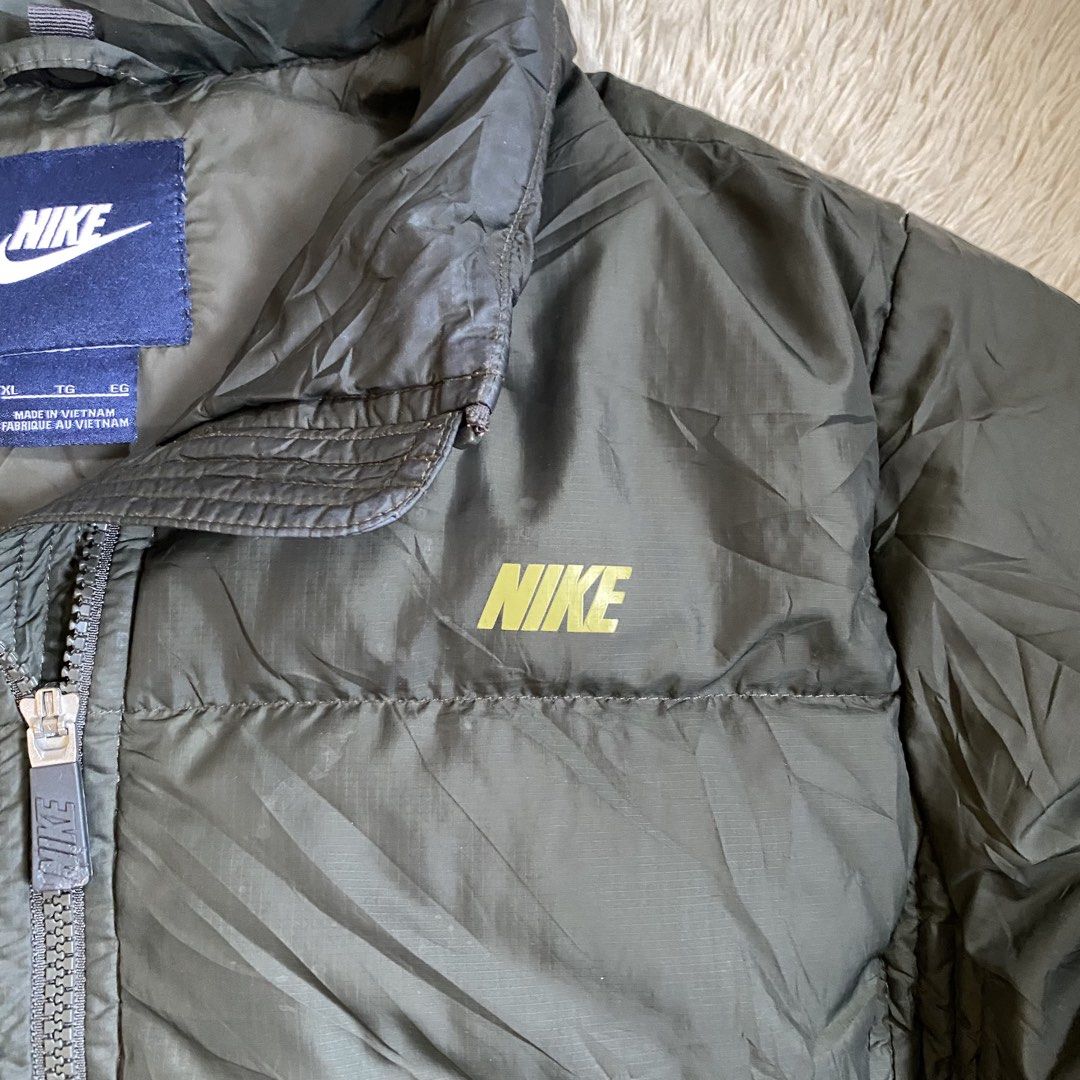 Nike Puffer Jacket (Category: Coats, Jackets and Outerwear) located in Cebu City. Submitted by stevenkylegil (Listing ID 1469038224, Image 2). Description: Nike Puffer Jacket Dimension: 20 width / 24 length Color rate: 10/10 Excellent condition - No issue Message me📩.