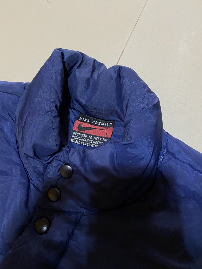 NIKE PUFFER VEST (Category: Vests) located in San Pablo. Submitted by tripnthrift15 (Listing ID 1468942609, Image 2). Description: VINTAGE NIKE PUFFER VEST SIZE LARGE ON TAG COMPLETE TAGS GOOD CONDITION DIMES 22*25 .