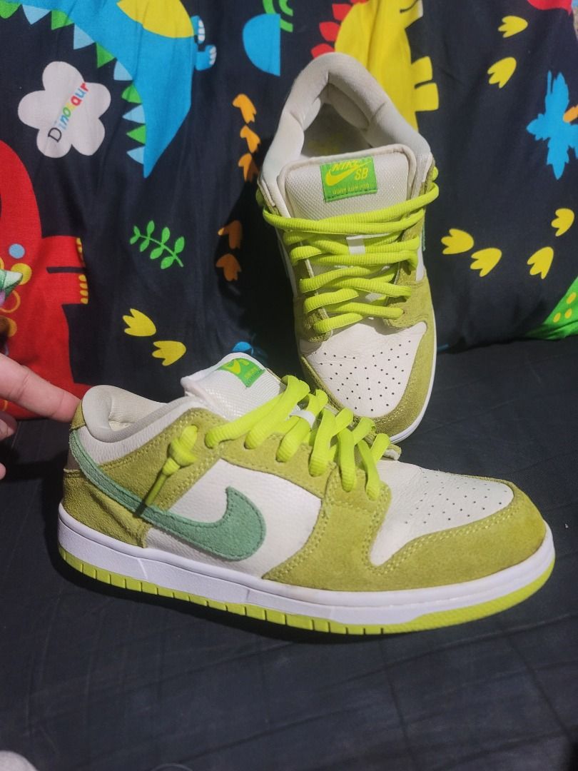 Nike SB Dunk Low Apple Green Size US 8 (Category: Sneakers) located in Caloocan City. Submitted by remwil18 (Listing ID 1468933403, Image 1). Description: - Model: Nike SB Dunk Low Apple Green - Size: US 8 / EUR 41 - Colorway: Green, white, and bright lime green - Materials: Suede and leather panels with Zoom Air cushioning - Special Feature: Cute apple graphic inside the tongue label - Condition: Minor red staining on the side panel of the left 