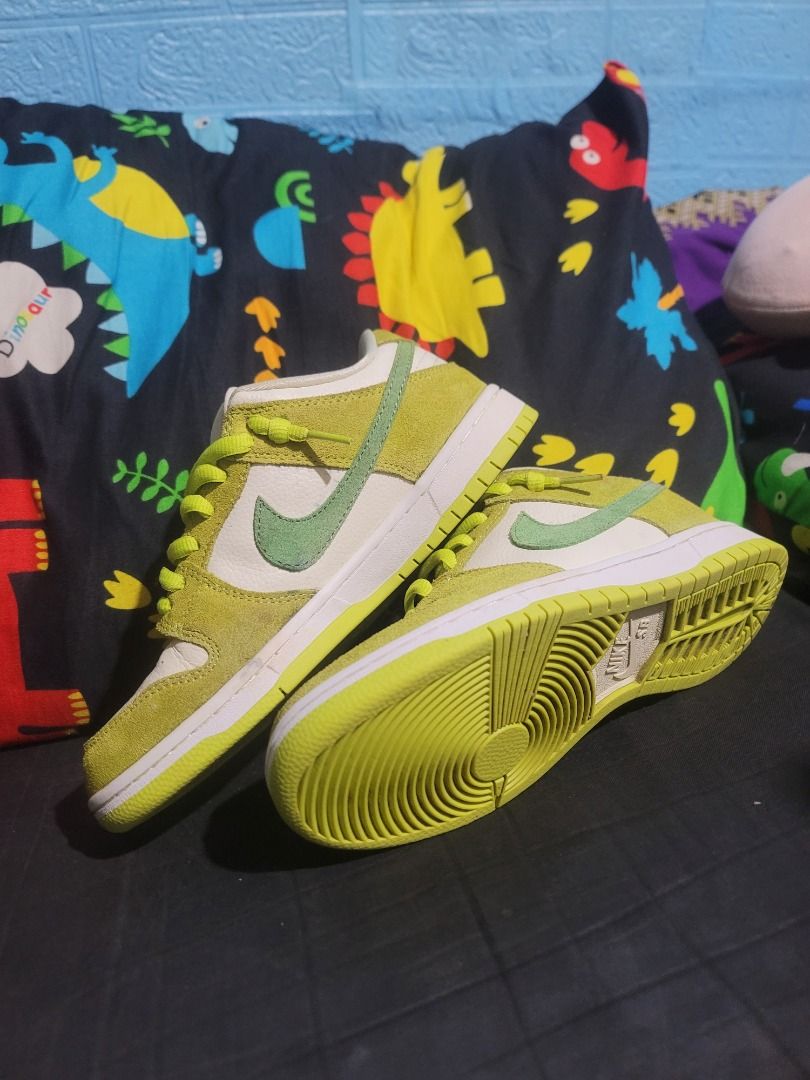 Nike SB Dunk Low Apple Green Size US 8 (Category: Sneakers) located in Caloocan City. Submitted by remwil18 (Listing ID 1468933403, Image 2). Description: - Model: Nike SB Dunk Low Apple Green - Size: US 8 / EUR 41 - Colorway: Green, white, and bright lime green - Materials: Suede and leather panels with Zoom Air cushioning - Special Feature: Cute apple graphic inside the tongue label - Condition: Minor red staining on the side panel of the left 