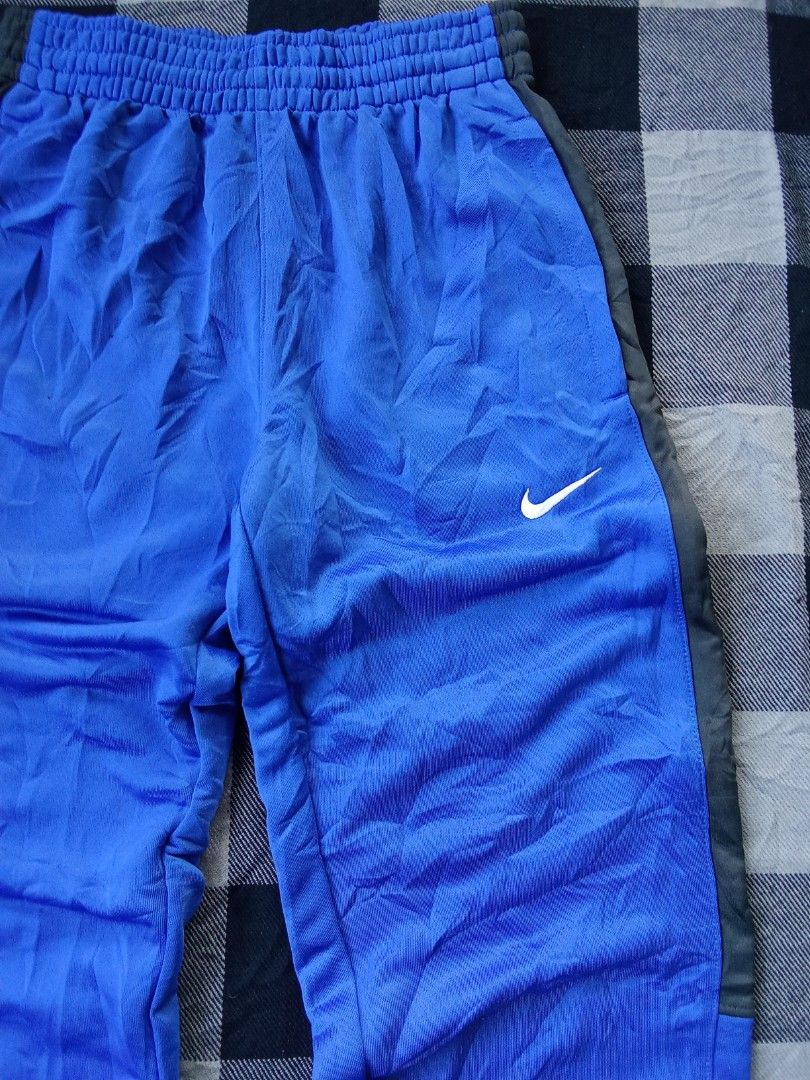 Nike Track Pants (Category: Activewear) located in Polomolok. Submitted by timog_high_ice (Listing ID 1468965256, Image 3). Description: - Blue/Black Color - Ankle zip - Jersy type - Waist 28-32 - Length 39.5 Maganda 🫶.
