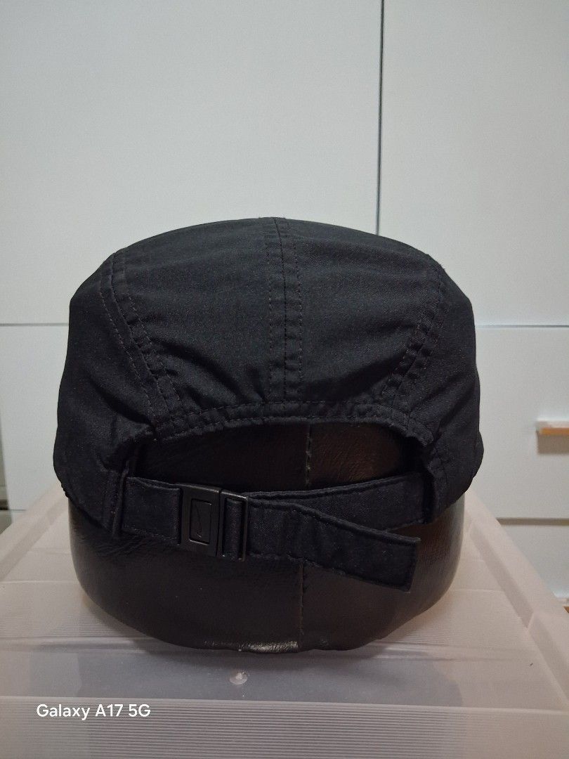 Nike Trail Running Cap Black (Category: Caps & Hats) located in Imus. Submitted by jefflac54673 (Listing ID 1468937176, Image 3). Description: - Color: Classic Black - Design: Triangle logo on front, Nike Trail print under the brim - Comfort: Lightweight build with interior mesh lining and branded tape - Fit: Adjustable strap with secure buckle closure - Best For: Outdoor runs, hikes, and everyday sporty wear.