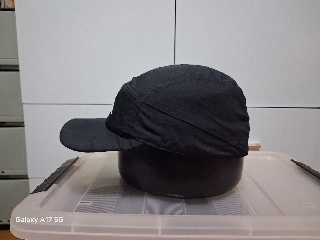 Nike Trail Running Cap Black (Category: Caps & Hats) located in Imus. Submitted by jefflac54673 (Listing ID 1468937176, Image 2). Description: - Color: Classic Black - Design: Triangle logo on front, Nike Trail print under the brim - Comfort: Lightweight build with interior mesh lining and branded tape - Fit: Adjustable strap with secure buckle closure - Best For: Outdoor runs, hikes, and everyday sporty wear.