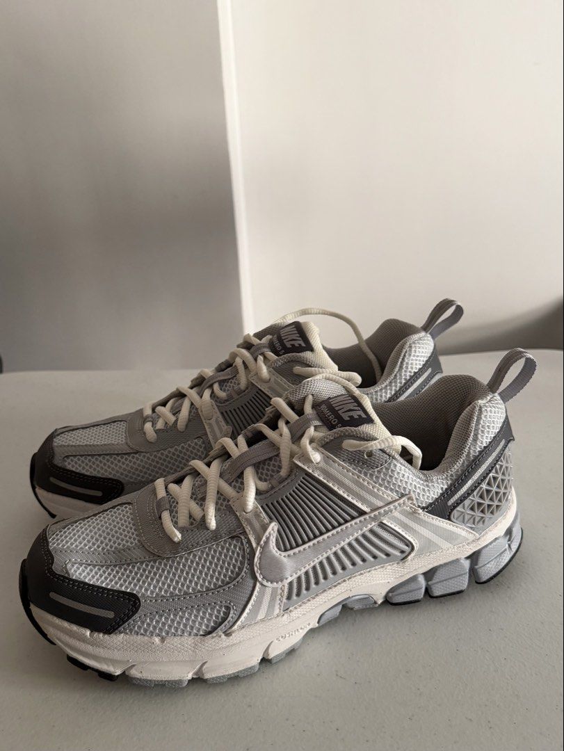 Nike Vomero 5 (Category: Sneakers) located in Manila. Submitted by rlbbgy56788 (Listing ID 1469013026, Image 1). Description: * Brand: Nike * Model: Vomero 5 * Color: Grey / Silver / White * Size: US 6.5Y / EU 39 / 24.5 cm * Suitable for men and women, depending on fit * Purchased in Singapore * Original box not included — shoes only Reason for selling: Wrong size / does not fit me. Price negotiable..