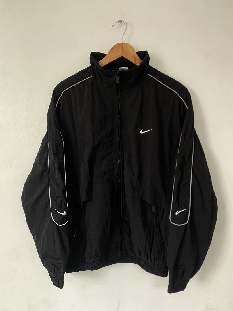 NIKE WINDBREAKER (Category: Coats, Jackets and Outerwear) located in Santa Rosa. Submitted by looted_thrifts (Listing ID 1468983325, Image 1). Description: NIKE WINDBREAKER - EXCELLENT CONDITION - AUTHENTIC/LEGIT - SIZE LARGE ON TAG (BOXY FIT) - WIDTH: 24 - LENGTH: 25.5 - 9.8/10 COLOR RATE - NO ISSUE 📥 DM TO PURCHASE.