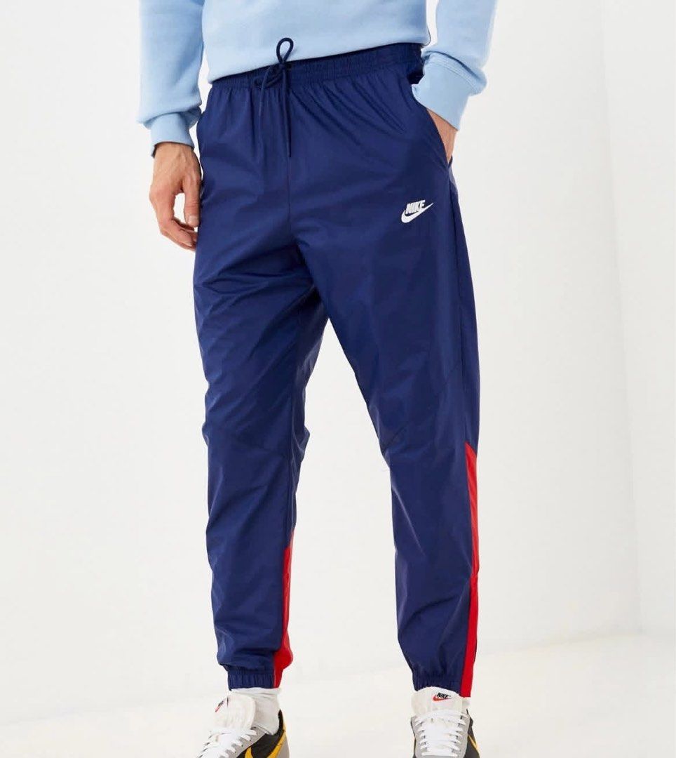 Nike Windrunner Nylon Track Pants (Category: Joggers) located in Pagadian. Submitted by angelcanzado (Listing ID 1468996424, Image 2). Description: Nike Windrunner Nylon Track Pants Excellent Condition Complete Tags Emboidered Logo Pockets both side Large on Tag Size: 31 - 34 Adjustable Drawstring garterize Length: 38 inches .