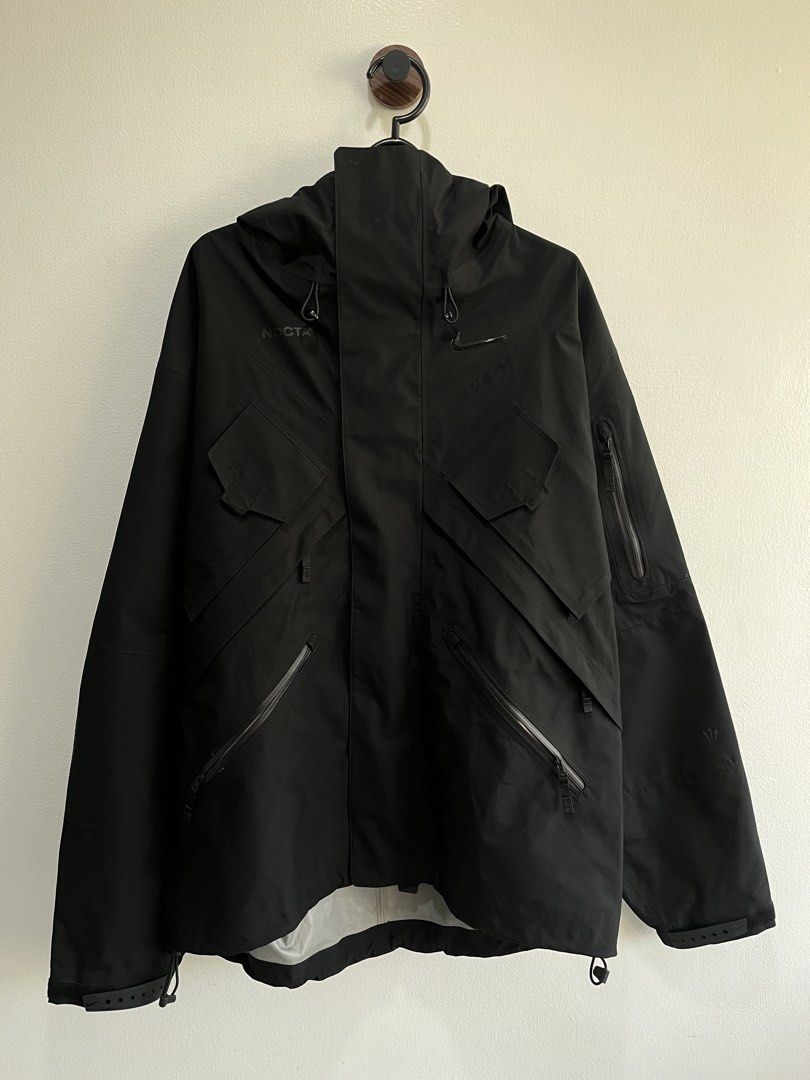 Nike x Drake NOCTA Tech Jacket (Category: Coats, Jackets and Outerwear) located in Quezon City. Submitted by shoeplug.ph (Listing ID 1468963211, Image 1). Description: Nike x Drake NOCTA Tech Jacket size: large / dimes 25x29 sleeves 26 Like New Condition ₱4,000.