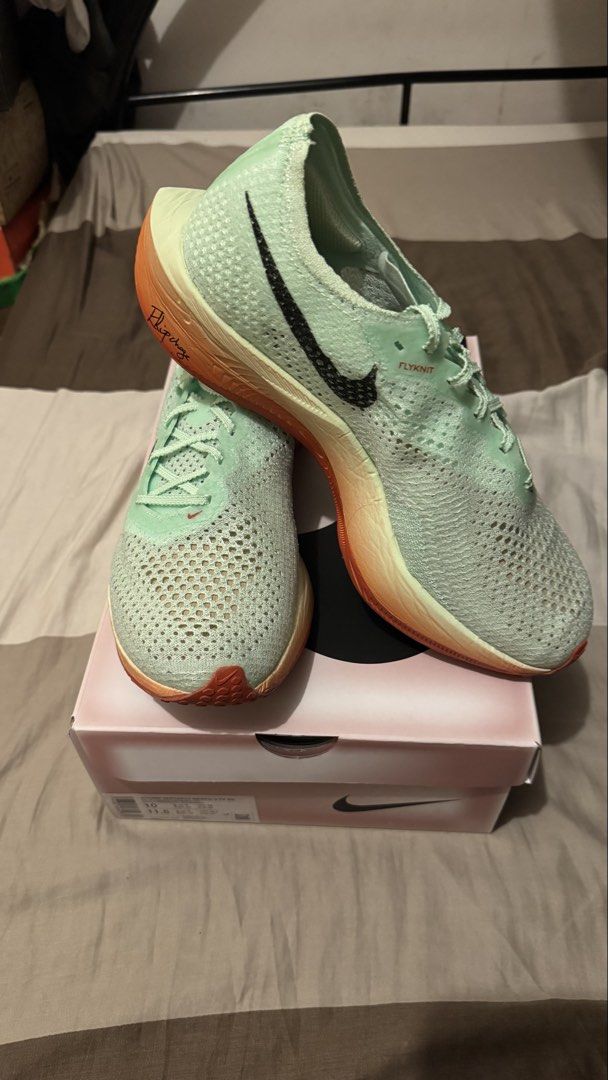 Nike ZoomX Vaporfly Next% 3 Flyknit (Category: Sneakers) located in Manila. Submitted by kimlj (Listing ID 1468990257, Image 2). Description: Nike ZoomX Vaporfly Next% 3 Flyknit running shoes. Colorway: Kipchoge Men size 10, women size 11.5. ZoomX foam midsole with Flyplate carbon fiber plate. Includes original box with matching size label..