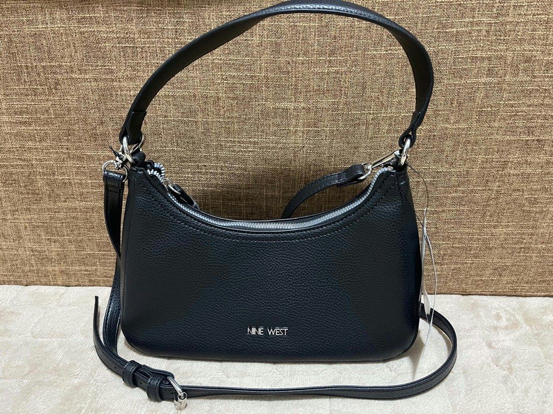 Nine West Sling bag (Category: Shoulder Bags) located in Quezon City. Submitted by mackoyusgoods (Listing ID 1469136501, Image 3). Description: .